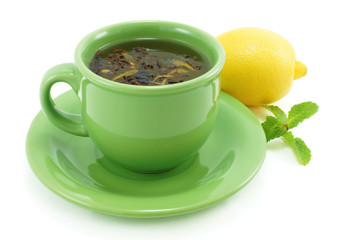 Cup with green tea, with mint and lemon.