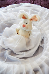 Toy rabbit in wedding dress