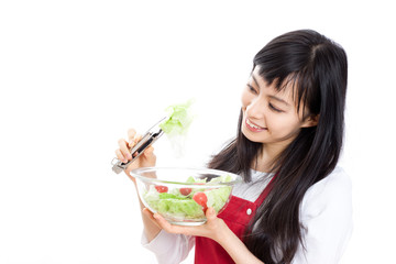 Obraz na płótnie Canvas 料理をする女性