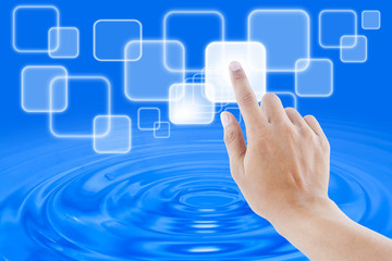 hand pushing a button on a touch screen interface