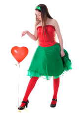 Woman with heart in hand sad