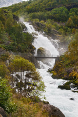 Fototapeta na wymiar Waterfall Kleivafossen in mountains of Norway