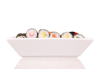 Sushi pieces on white background © Jag_cz