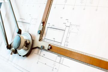 Drawing board with white project blueprint