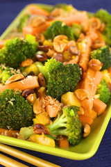 Vegetarian stir-fry Thai-style with broccoli, carrot, mango