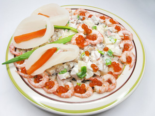 squid meal with red caviar salad