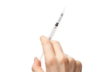 Female hand with syringe