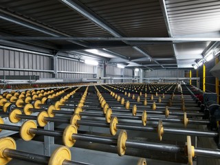 Rollers in a glass factory production line.