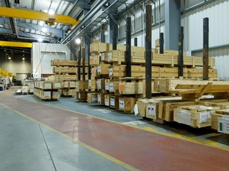 Long wooden crates in an industrial storage aera