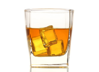 Glass of scotch whiskey and ice isolated on white