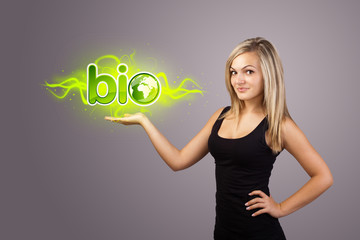 woman holding virtual eco sign
