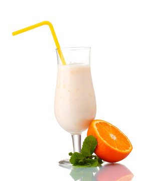 Bunch of bananas and milk cocktail isolated on white