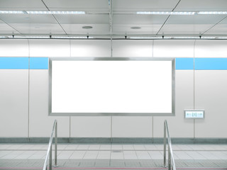 Blank billboard in underground passage