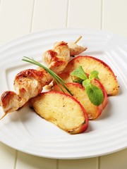 Chicken skewer and baked apple