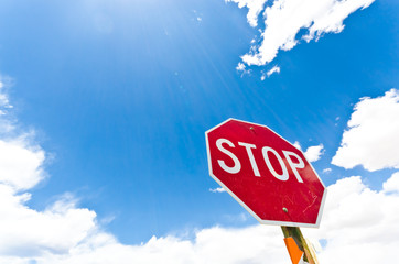Stop signal in a summer sky