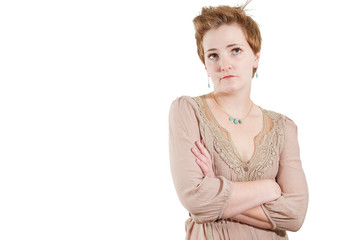 Annoyed woman isolated over white