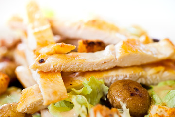 Chicken salad with grated carrots, mushrooms, bread croutons and