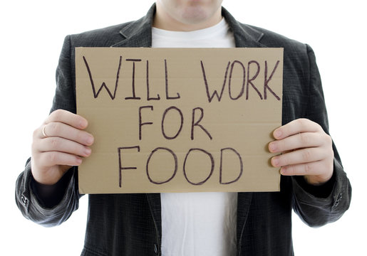 Unemployed with a sign WILL WORK FOR FOOD.