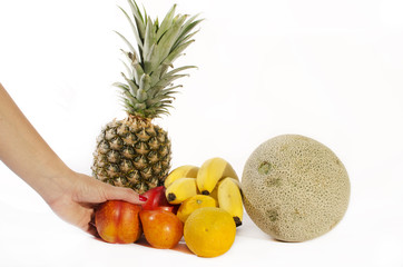 Women choosing tropical fruits