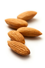 Almonds on the white background