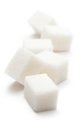 Cubes of sugar on the white background