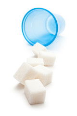 Cubes of sugar with plastic cup