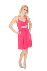 Beautiful young woman posing in dress