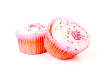 Two delicious pink sweet cupcakes