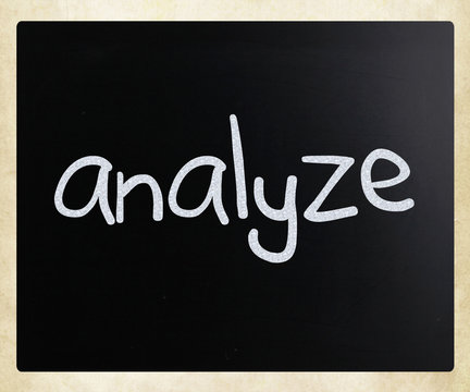 "Analyze" handwritten with white chalk on a blackboard