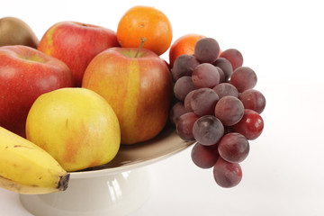 Naklejka na ściany i meble Frische Früchte in einer Obstschale