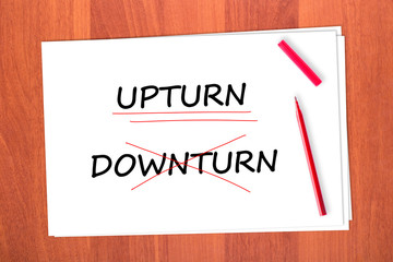 Chose the word UPTURN, crossed out the word DOWNTURN