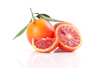 Blood red oranges isolated on white background