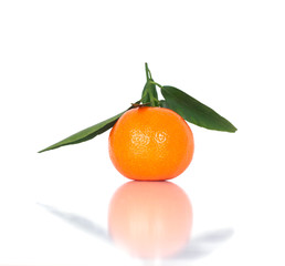 Tangerine with leaf. One mandarin isolated on white