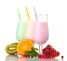 Milk shakes with fruits isolated on white