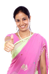 Traditional young Indian woman showing thumbs up