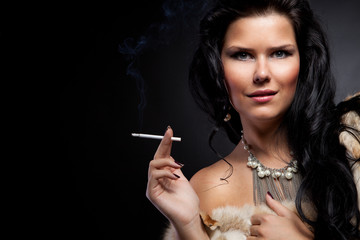 Obraz premium Portrait of stylish woman in fur