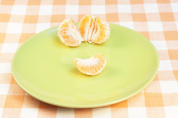 Tangerine on plate