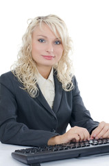 The young girl behind the computer