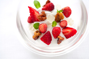 Yogurt with strawberries and nuts