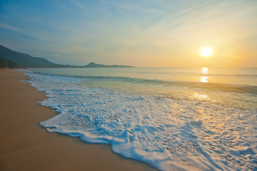 Tropical beach at sunrise