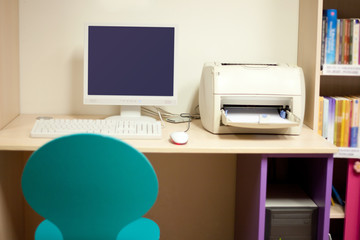 keyboard mouse and printer on desk