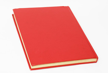 Red book on white background