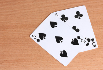 Two cards on wooden background