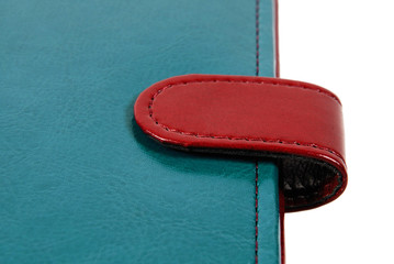 Blue and red leather organizer closeup