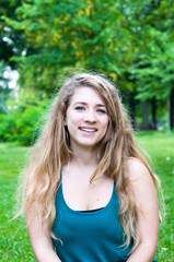 Naklejka premium smiling young attractive woman