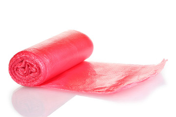 Roll of red garbage bags isolated on white