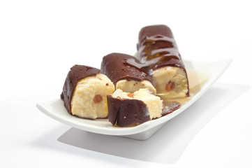 Chocolate curd cakes  with honey  on plate