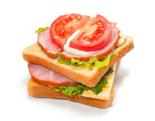 Ham sandwich with cheese, tomatoes and lettuce