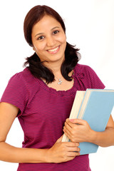 Smiling Indian student against white background