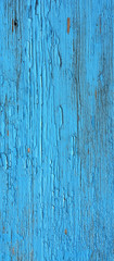 Closing on blue wooden panels of the fence
